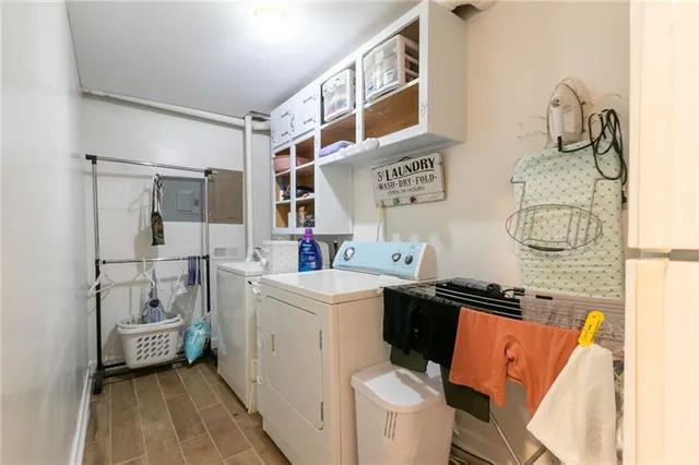 a storage room with washer and dryer