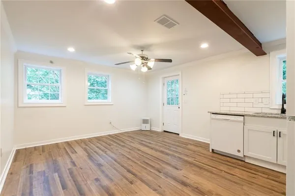 a view of kitchen and windows