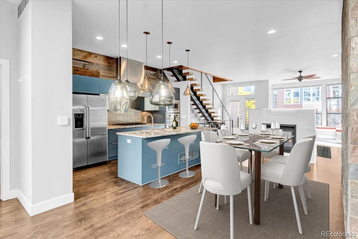 2900 Inca Street, Unit 15 Denver, CO 80202 - Photo 2 of 40 a kitchen with a sink cabinets and window