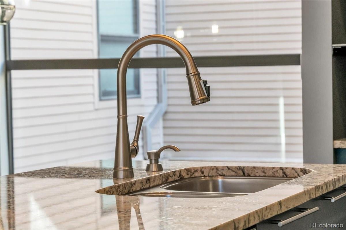 2900 Inca Street, Unit 15 Denver, CO 80202 - Photo 38 of 40 a close view of sink and tap