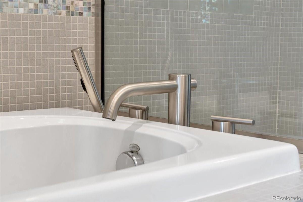 2900 Inca Street, Unit 15 Denver, CO 80202 - Photo 40 of 40 a bathroom with a bathtub