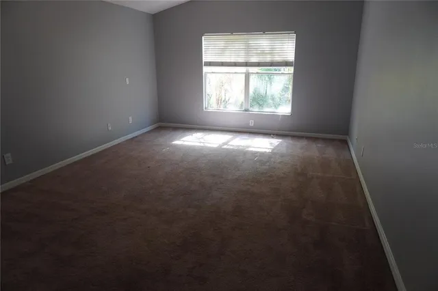 an empty room with a window