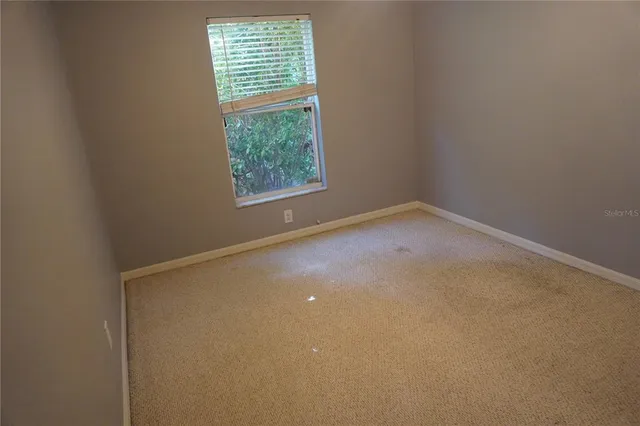 an empty room with a window