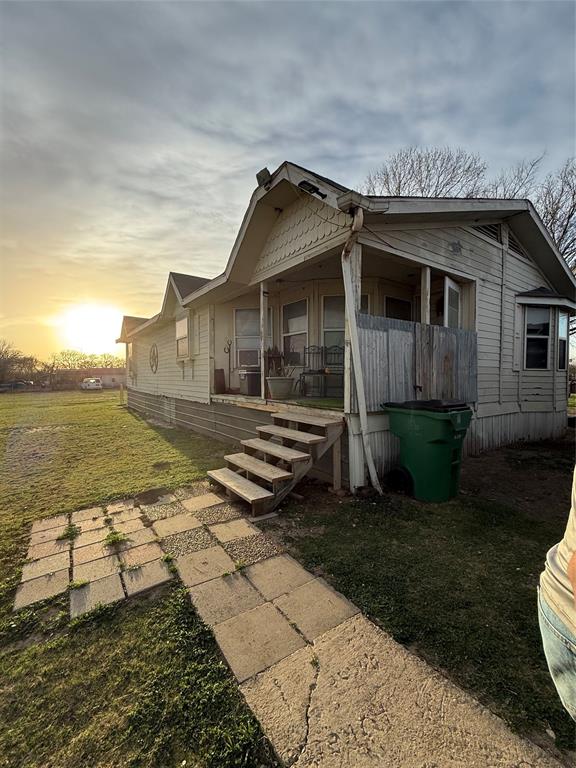 1309 Monthie Road Waco, TX 76705 - Photo 1 of 1 a view of a small house with wooden fence