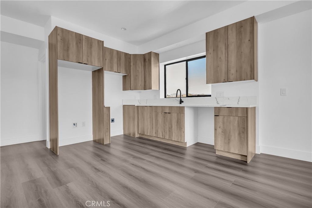 1571 Ricardo Street Los Angeles, CA 90033 - Photo 13 of 19 a view of kitchen with wooden floor and electronic appliances