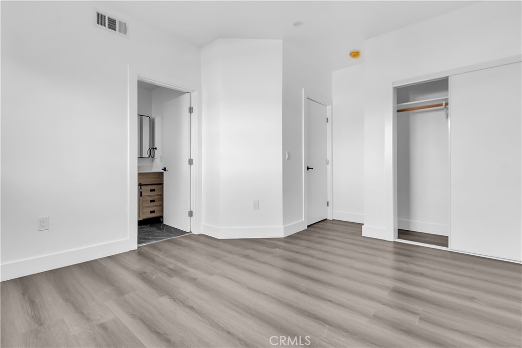 1571 Ricardo Street Los Angeles, CA 90033 - Photo 2 of 19 a view of an empty room and wooden floor