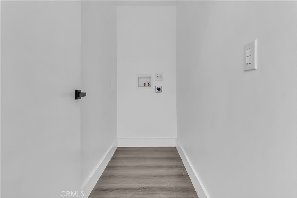 1571 Ricardo Street Los Angeles, CA 90033 - Photo 5 of 19 a view of a hallway with wooden floor