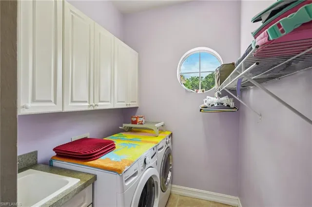 a bathroom with a sink mirror and a bathtub