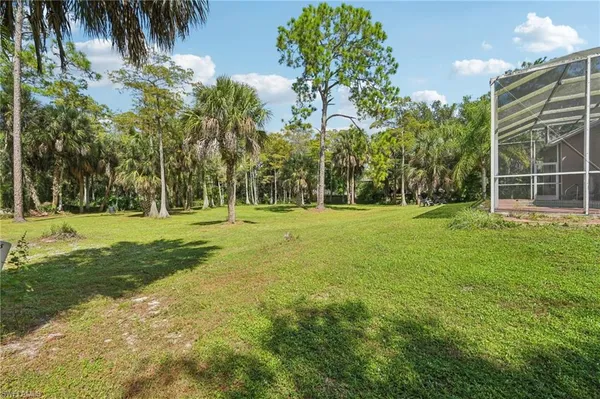 a view of a house with a big yard