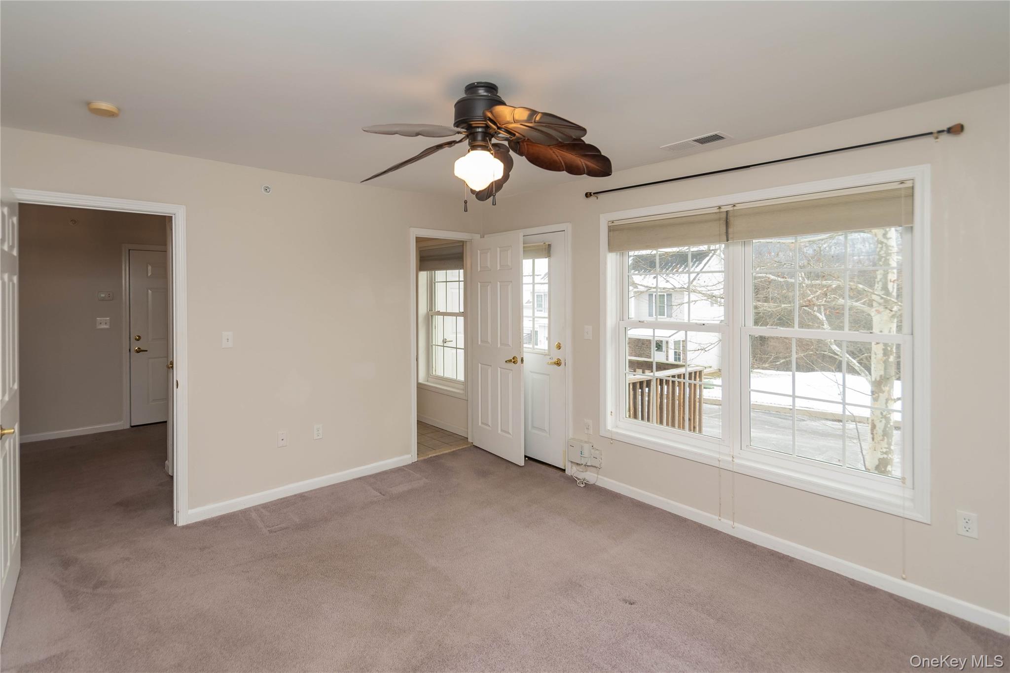 70 Aveonis Court Fishkill, NY 12524 - Photo 10 of 19 Unfurnished room featuring light carpet and ceiling fan