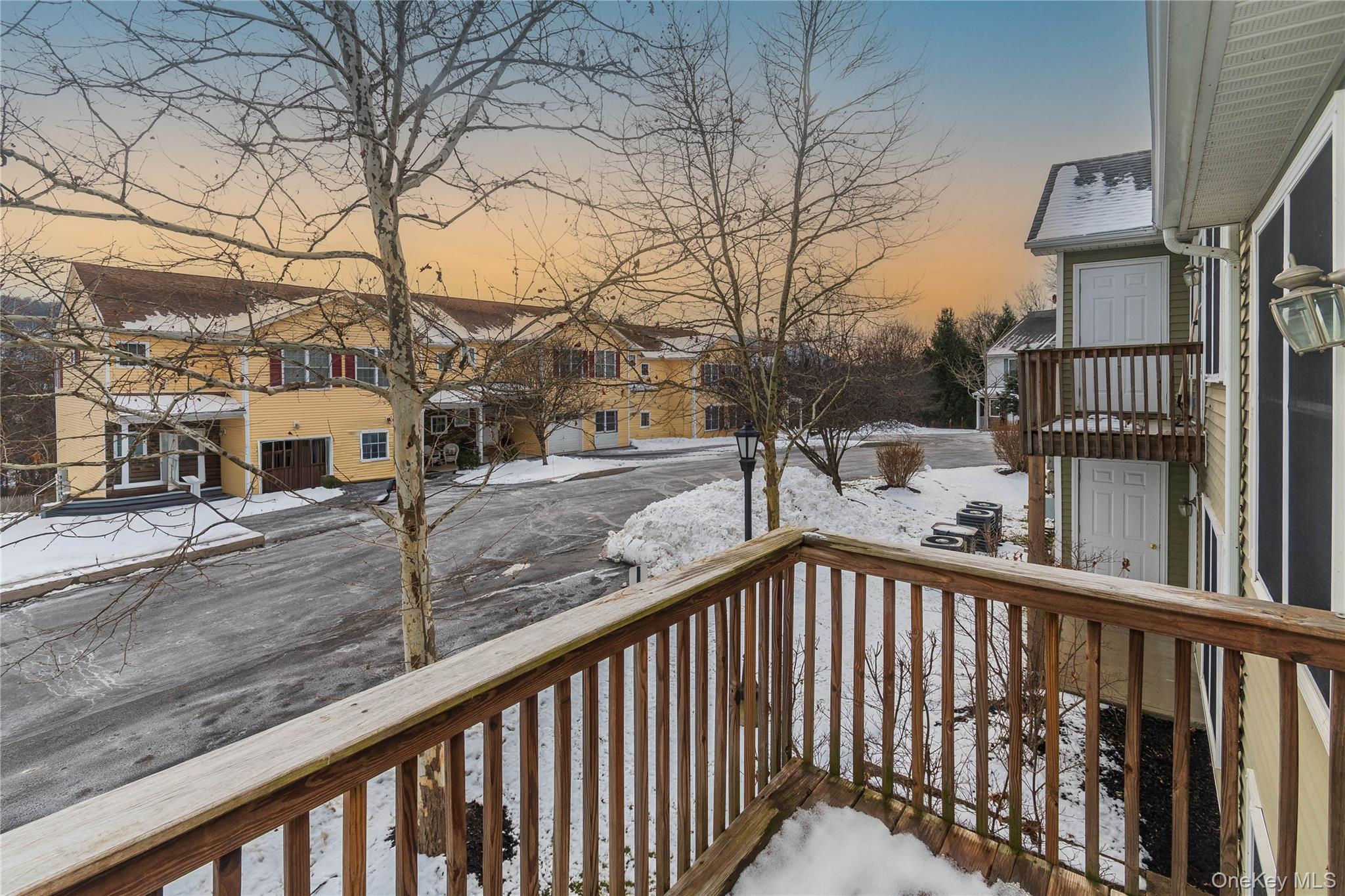 70 Aveonis Court Fishkill, NY 12524 - Photo 16 of 19 Snow covered deck featuring a balcony and a residential view