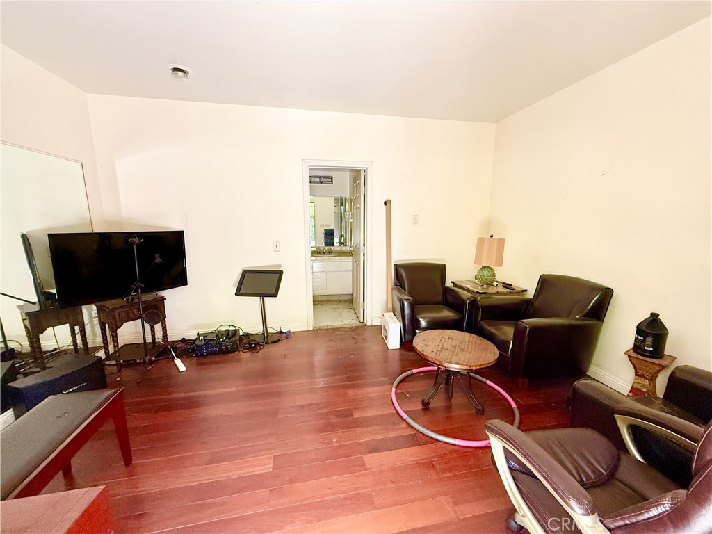 2510 Lorain Road San Marino, CA 91108 - Photo 16 of 17 a living room with furniture and a flat screen tv