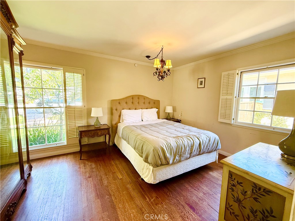 2510 Lorain Road San Marino, CA 91108 - Photo 5 of 17 a spacious bedroom with a bed and wooden floor