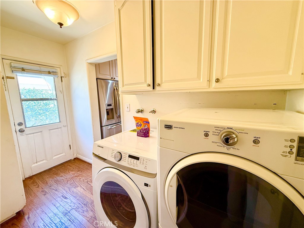 2510 Lorain Road San Marino, CA 91108 - Photo 7 of 17 a utility room with dryer and washer