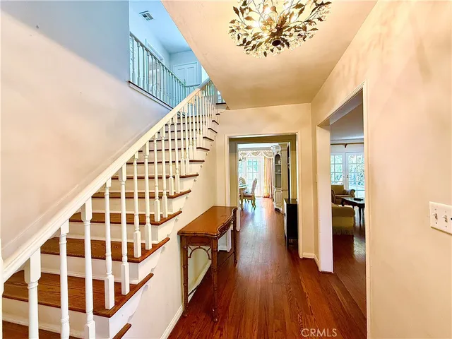a view of entryway with wooden floor