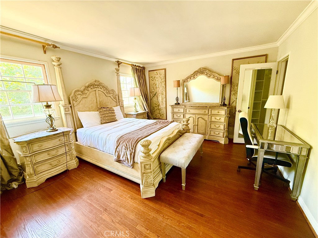 2510 Lorain Road San Marino, CA 91108 - Photo 9 of 17 a bedroom with a bed and wooden floor