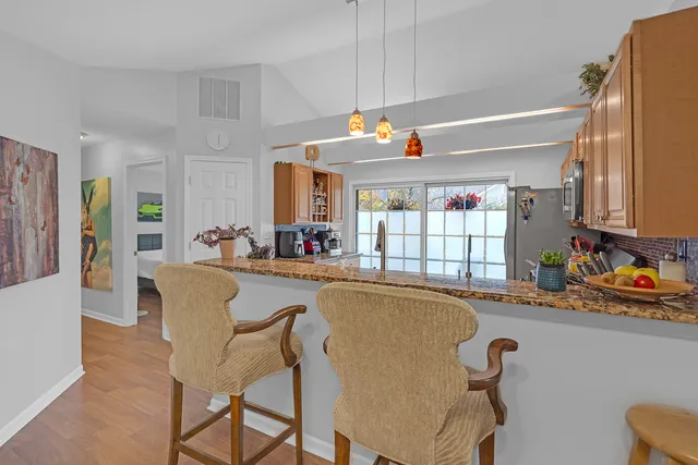 a bathroom with a double vanity sink and mirror