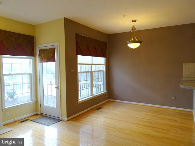 an empty room with window