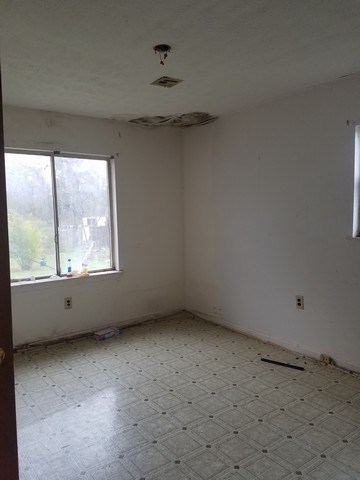 145 Renfroe Rd Union Springs Union Springs, AL 36089 - Photo 3 of 8 an empty room with a window