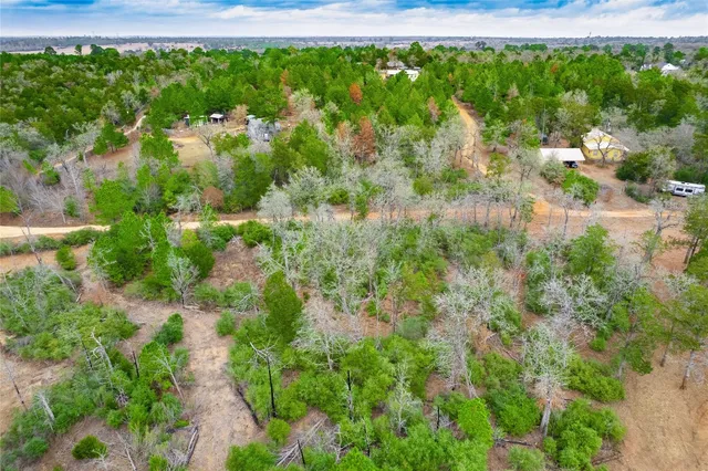 a view of a lake beach and mountain
