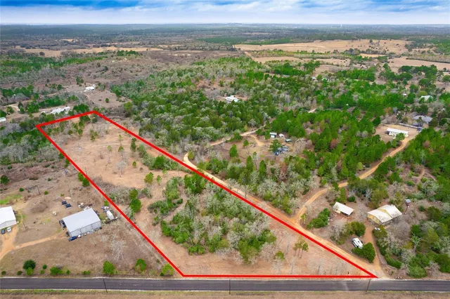 a view of mountain with a lake