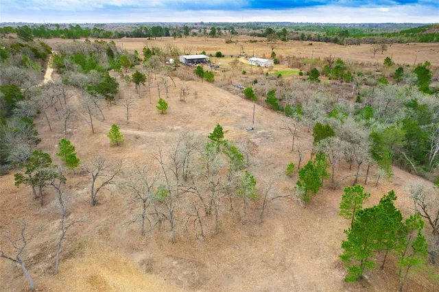 a view of a city with mountains in the background