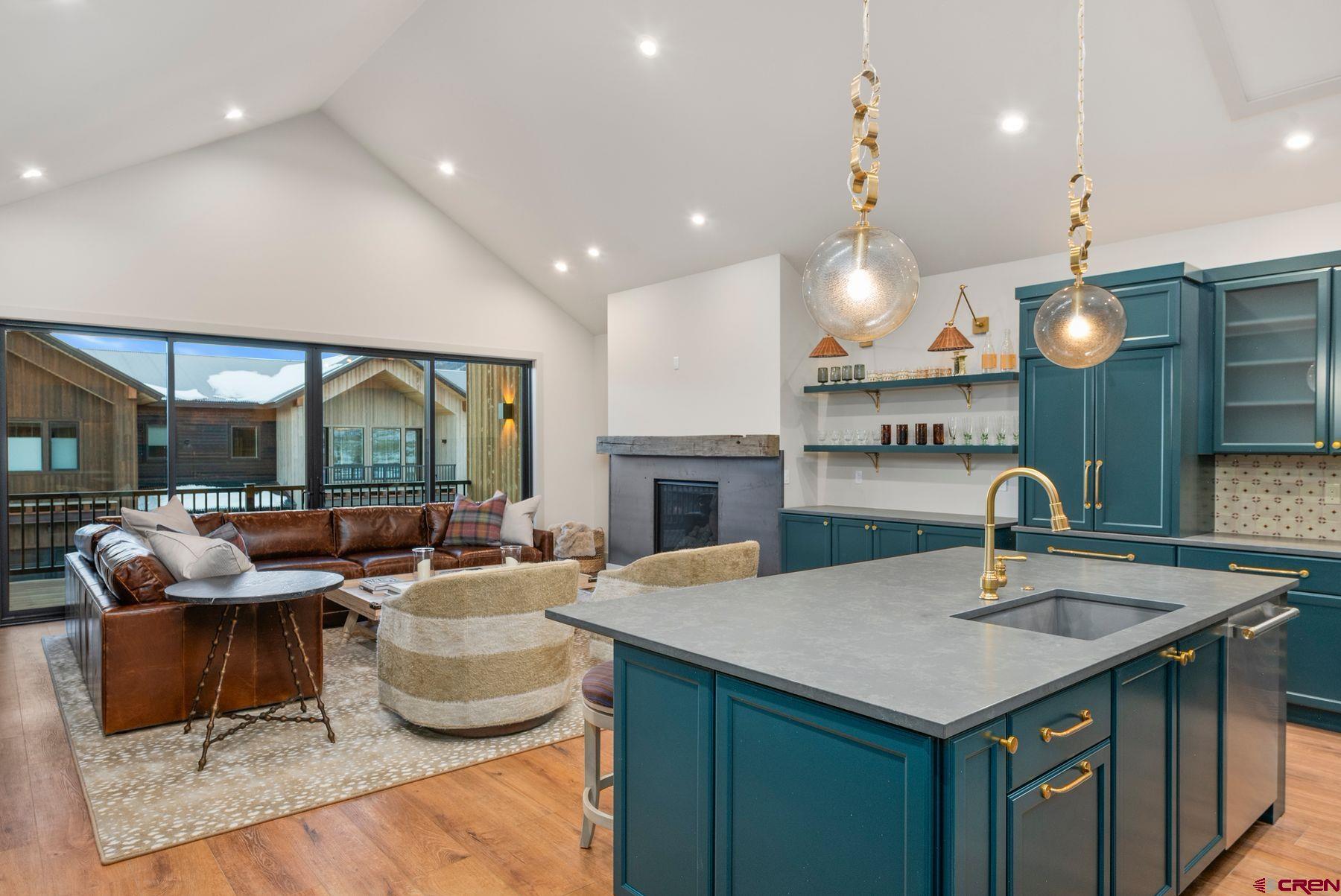 180 Elk Valley Road, Unit 116 Crested Butte, CO 81224 - Photo 1 of 26 a kitchen with a sink and a large window
