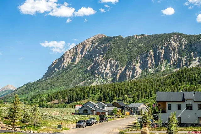 a view of a swimming pool with a yard