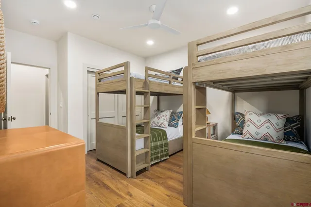 a bedroom with bed and walk in closet