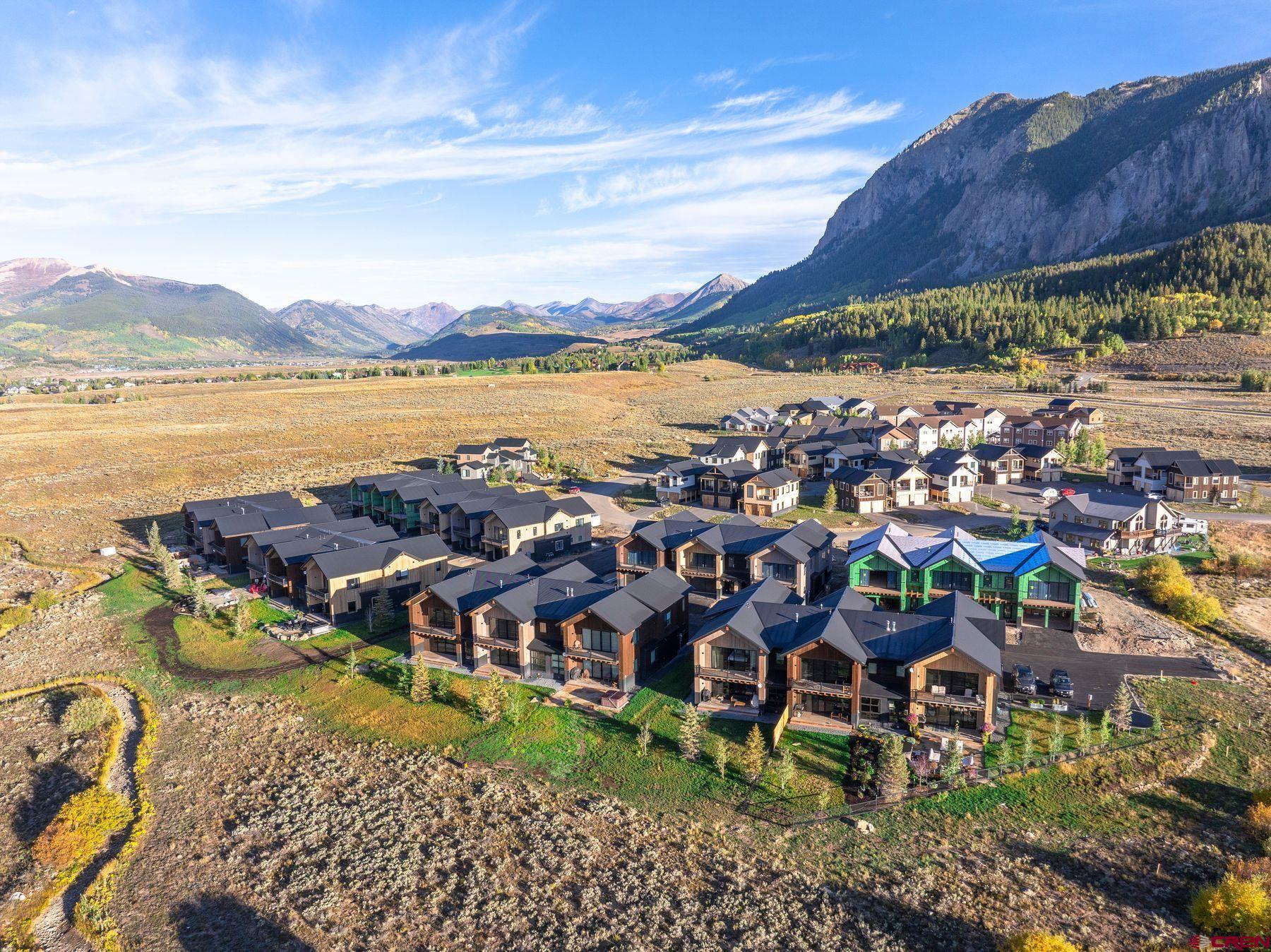 180 Elk Valley Road, Unit 116 Crested Butte, CO 81224 - Photo 24 of 26 a view of a city with lake