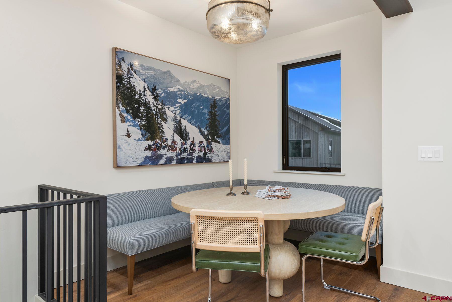 180 Elk Valley Road, Unit 116 Crested Butte, CO 81224 - Photo 9 of 26 a view of a dining room with furniture