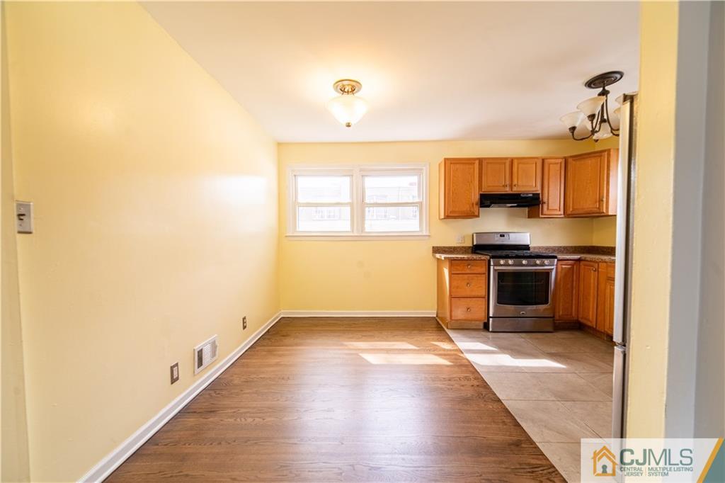 16 Homes Street Edison, NJ 08817 - Photo 15 of 21 a view of a kitchen with a sink and a window