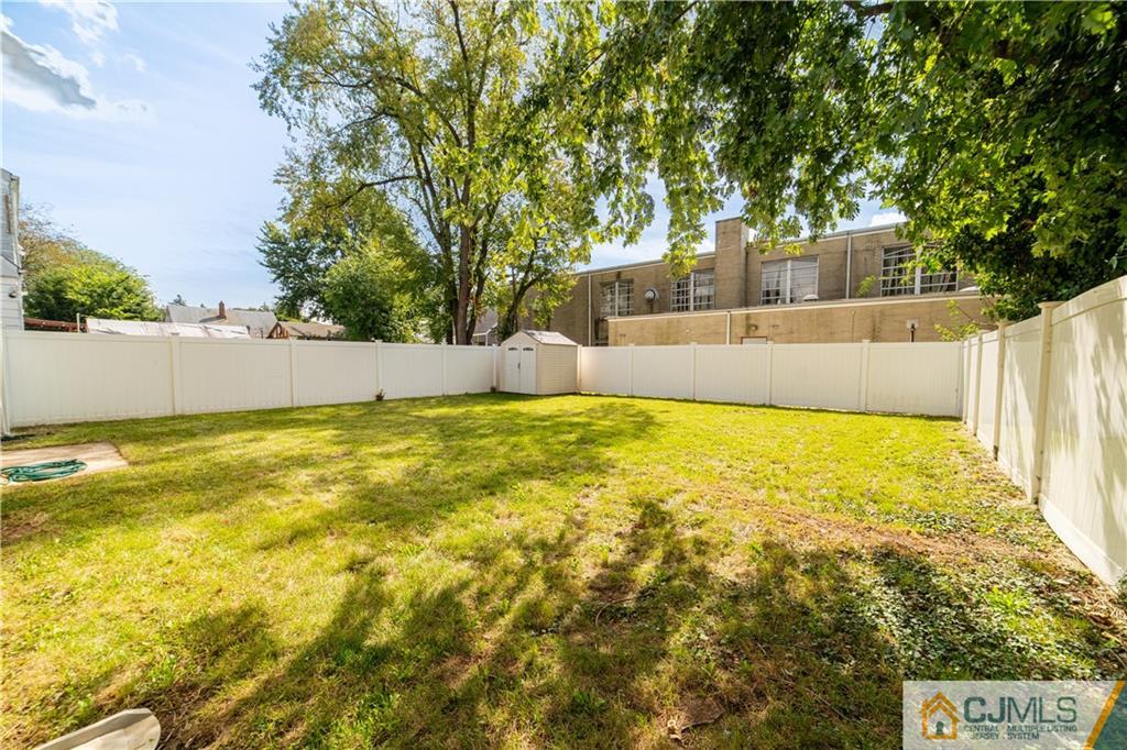 16 Homes Street Edison, NJ 08817 - Photo 9 of 21 a view of an outdoor space and swimming pool