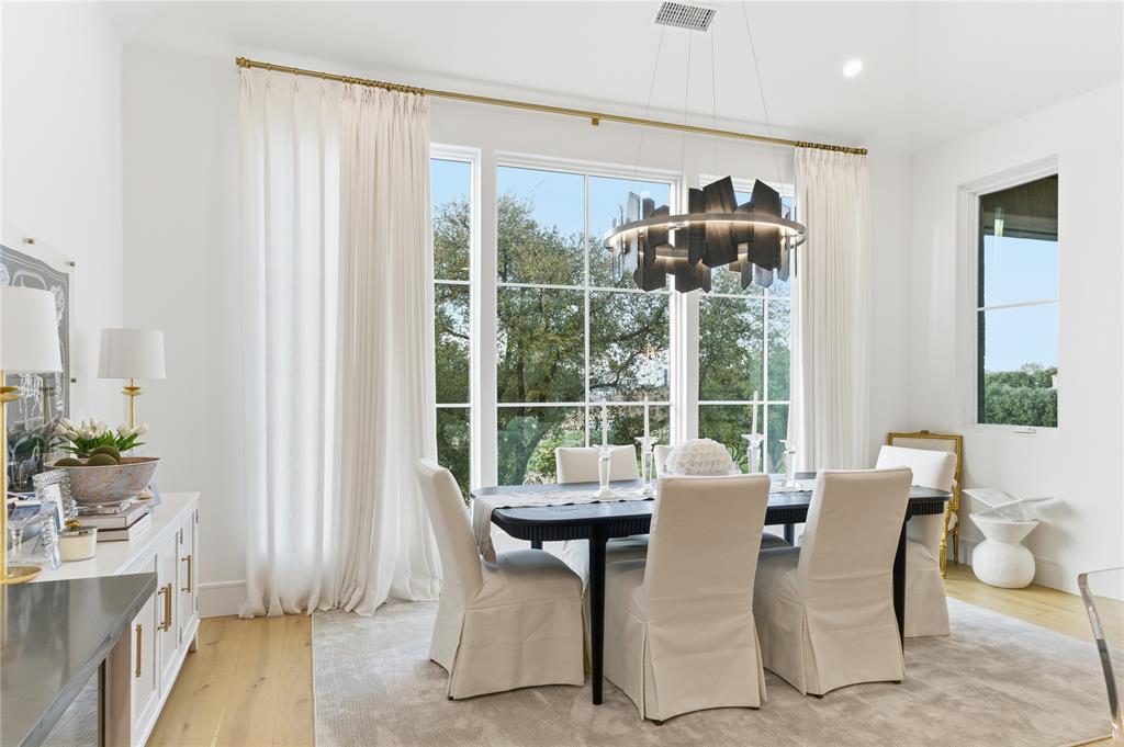 320 O Connor Ridge Boulevard, Unit 22 Irving, TX 75038 - Photo 18 of 34 a view of a dining room with furniture window and outside view