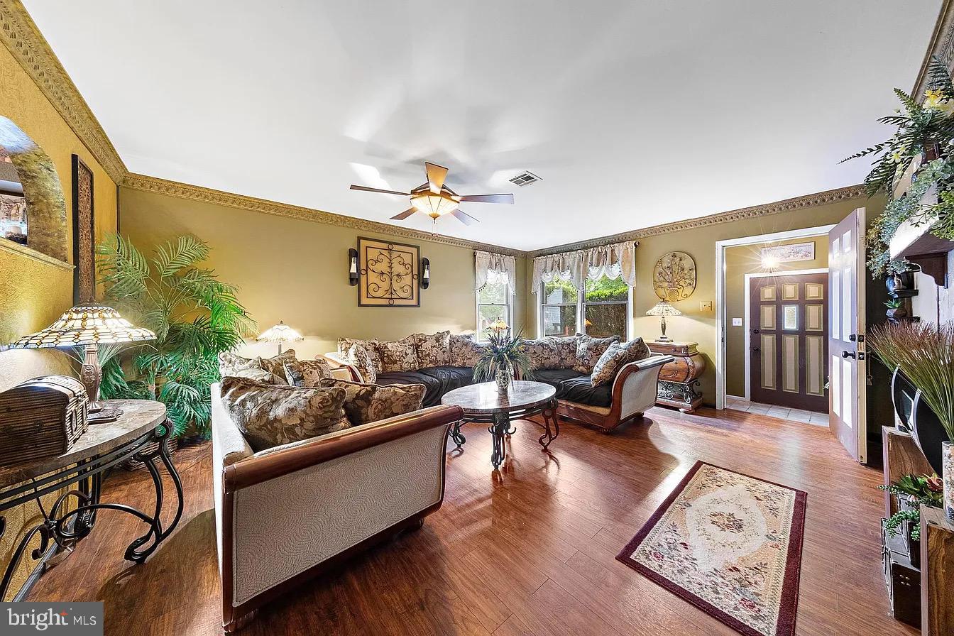 22 Fir Road Manahawkin, NJ 08050 - Photo 7 of 35 a living room with furniture and wooden floor