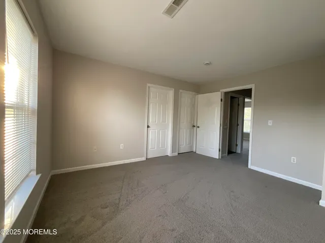 an empty room with window