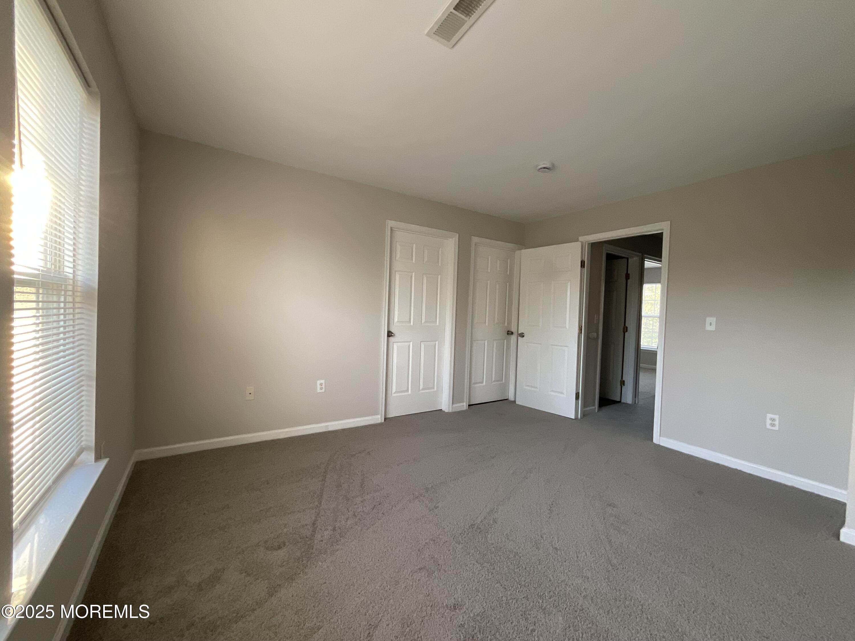 12 Abby Road, Unit 75 Farmingdale, NJ 07727 - Photo 14 of 20 an empty room with window