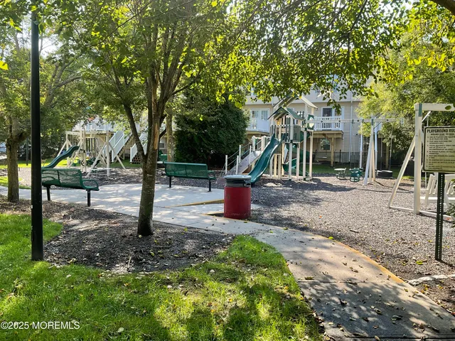 a view of a park with swings