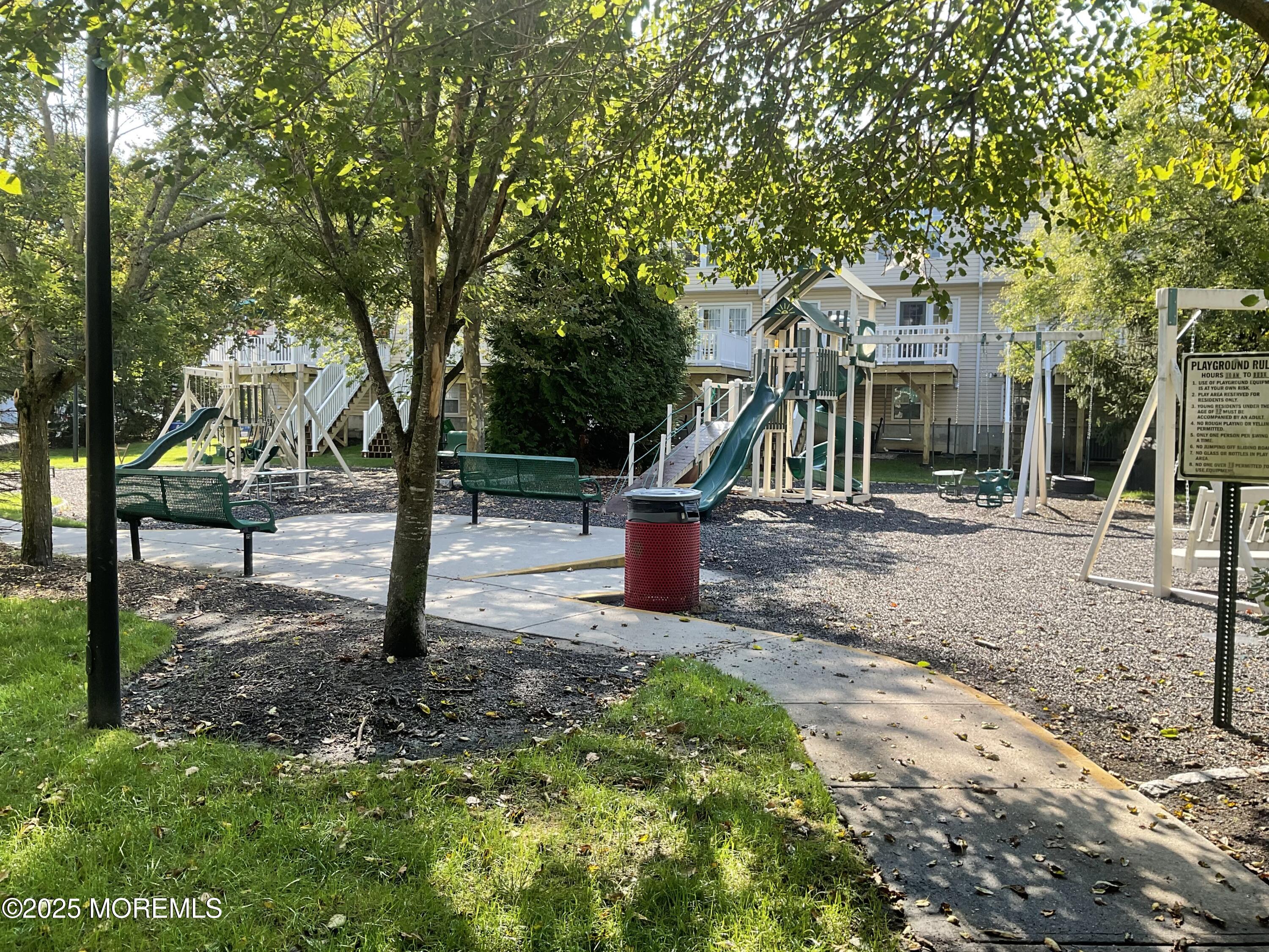 12 Abby Road, Unit 75 Farmingdale, NJ 07727 - Photo 19 of 20 a view of a park with swings
