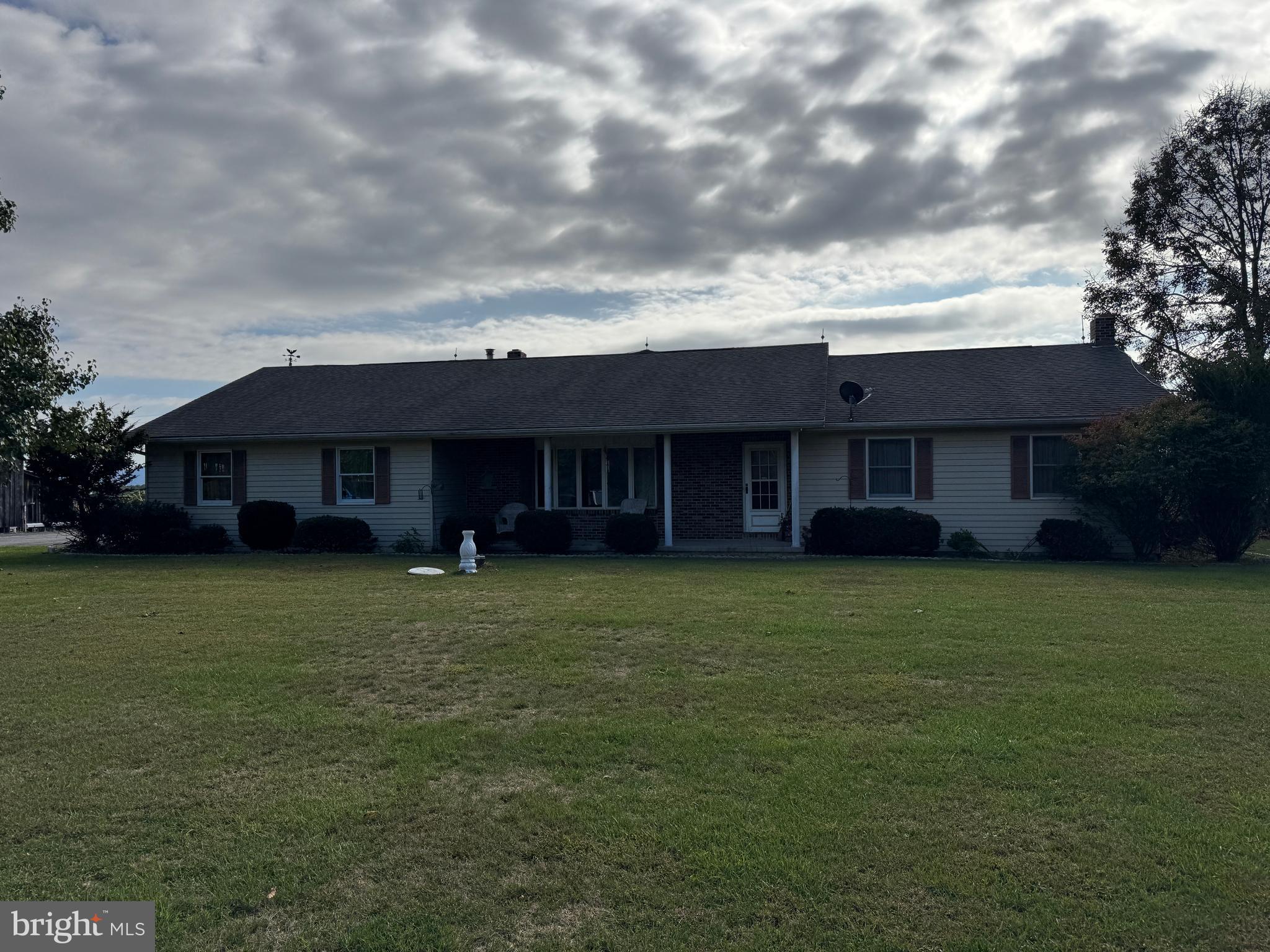 13677 Piney Ridge Road Huntingdon, PA 16652 - Photo 18 of 93 a view of a big house with a big yard and large trees