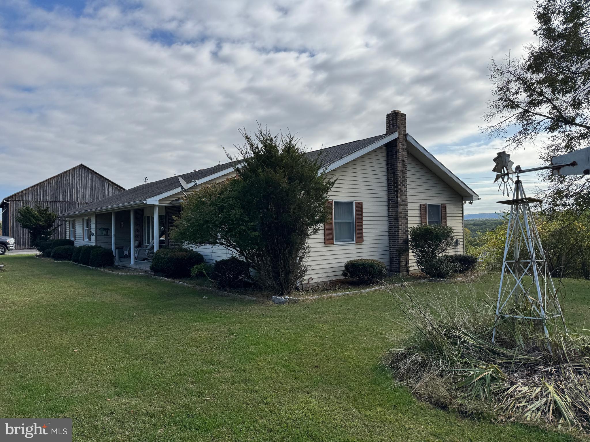 13677 Piney Ridge Road Huntingdon, PA 16652 - Photo 22 of 93 a view of a house with a yard and sitting area