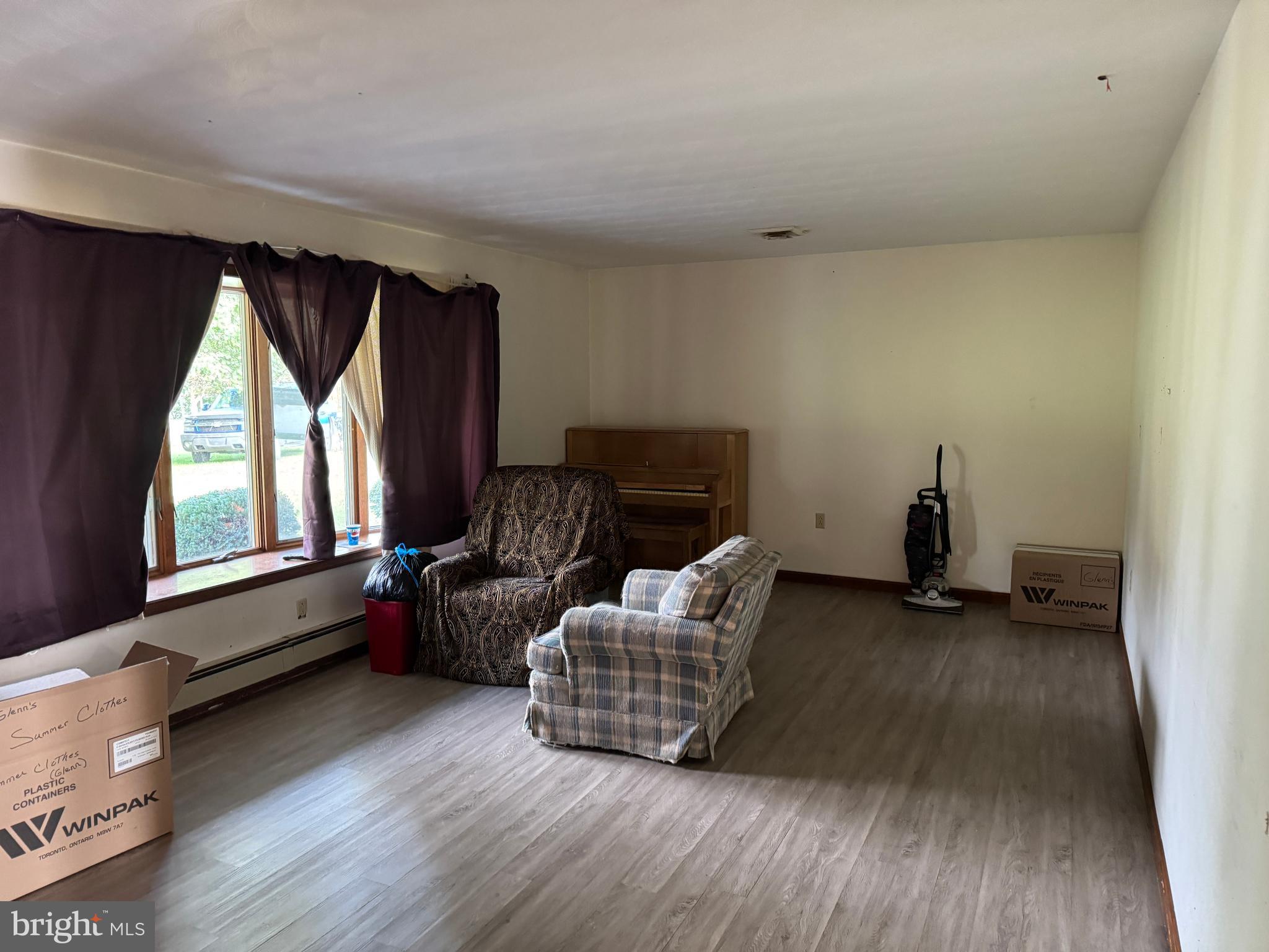 13677 Piney Ridge Road Huntingdon, PA 16652 - Photo 52 of 93 a living room with furniture and a window