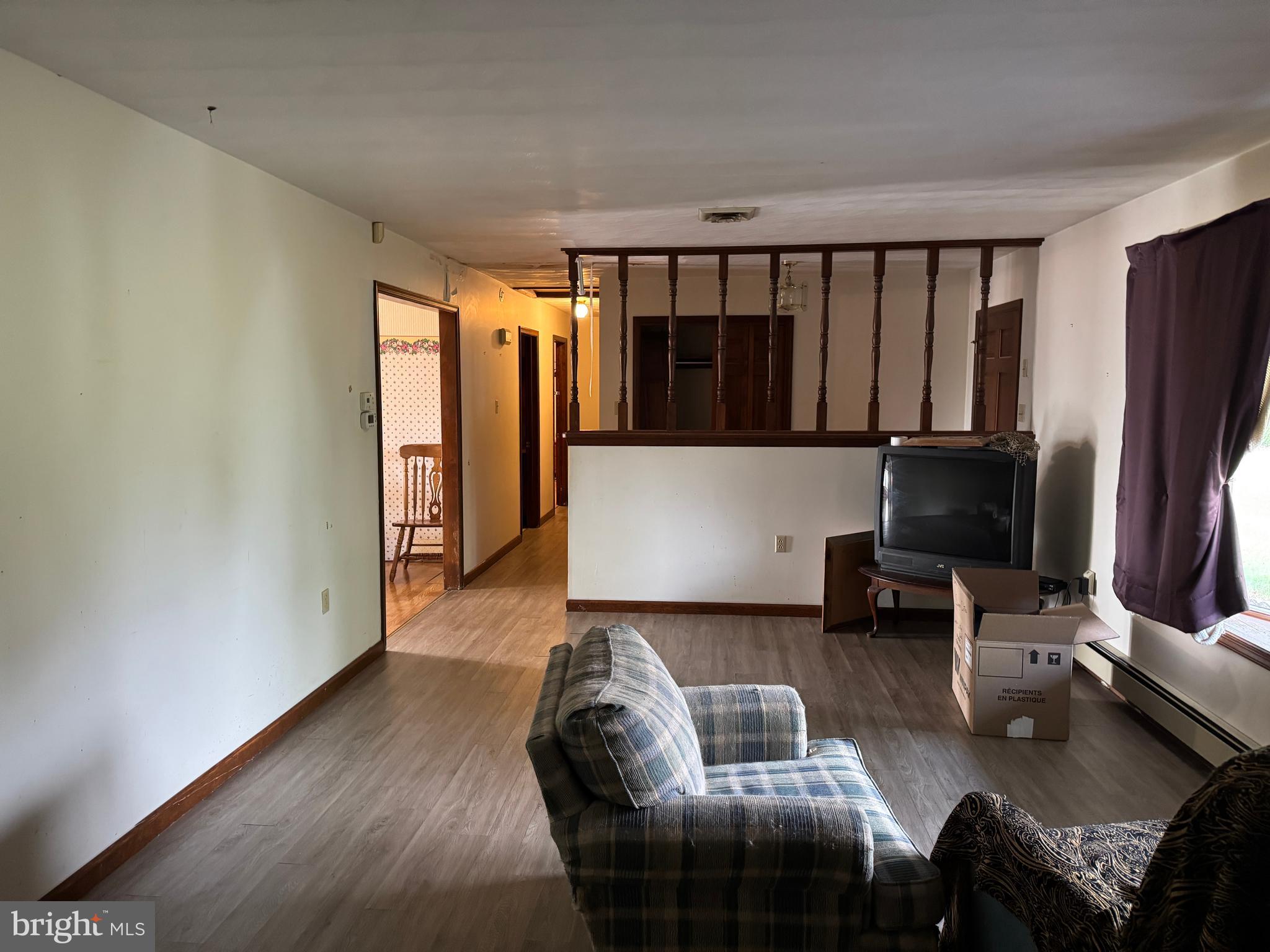 13677 Piney Ridge Road Huntingdon, PA 16652 - Photo 53 of 93 a living room with furniture window and a flat screen tv
