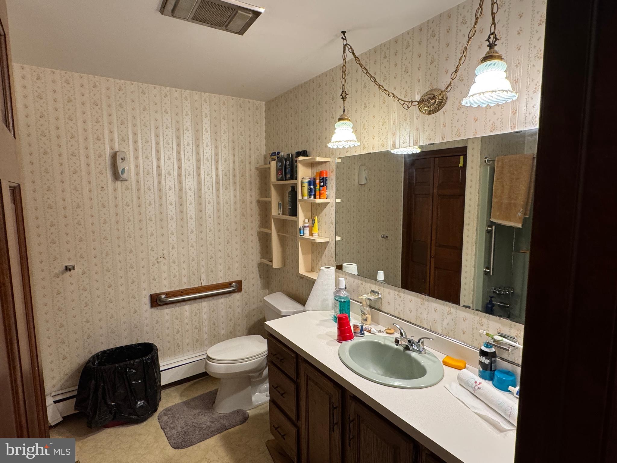 13677 Piney Ridge Road Huntingdon, PA 16652 - Photo 63 of 93 a bathroom with a granite countertop sink toilet and shower