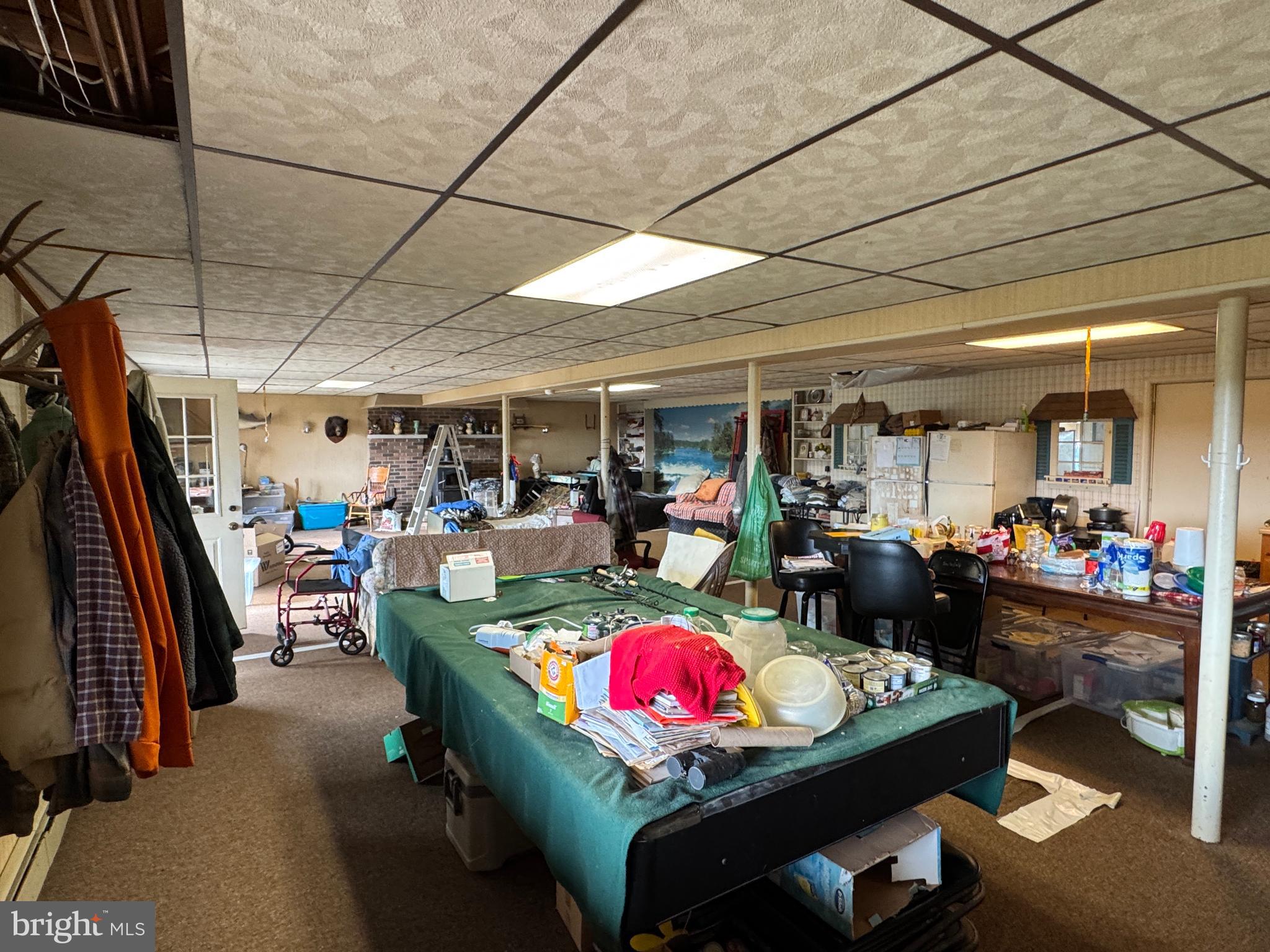 13677 Piney Ridge Road Huntingdon, PA 16652 - Photo 66 of 93 a living room with lots of furniture and clutter