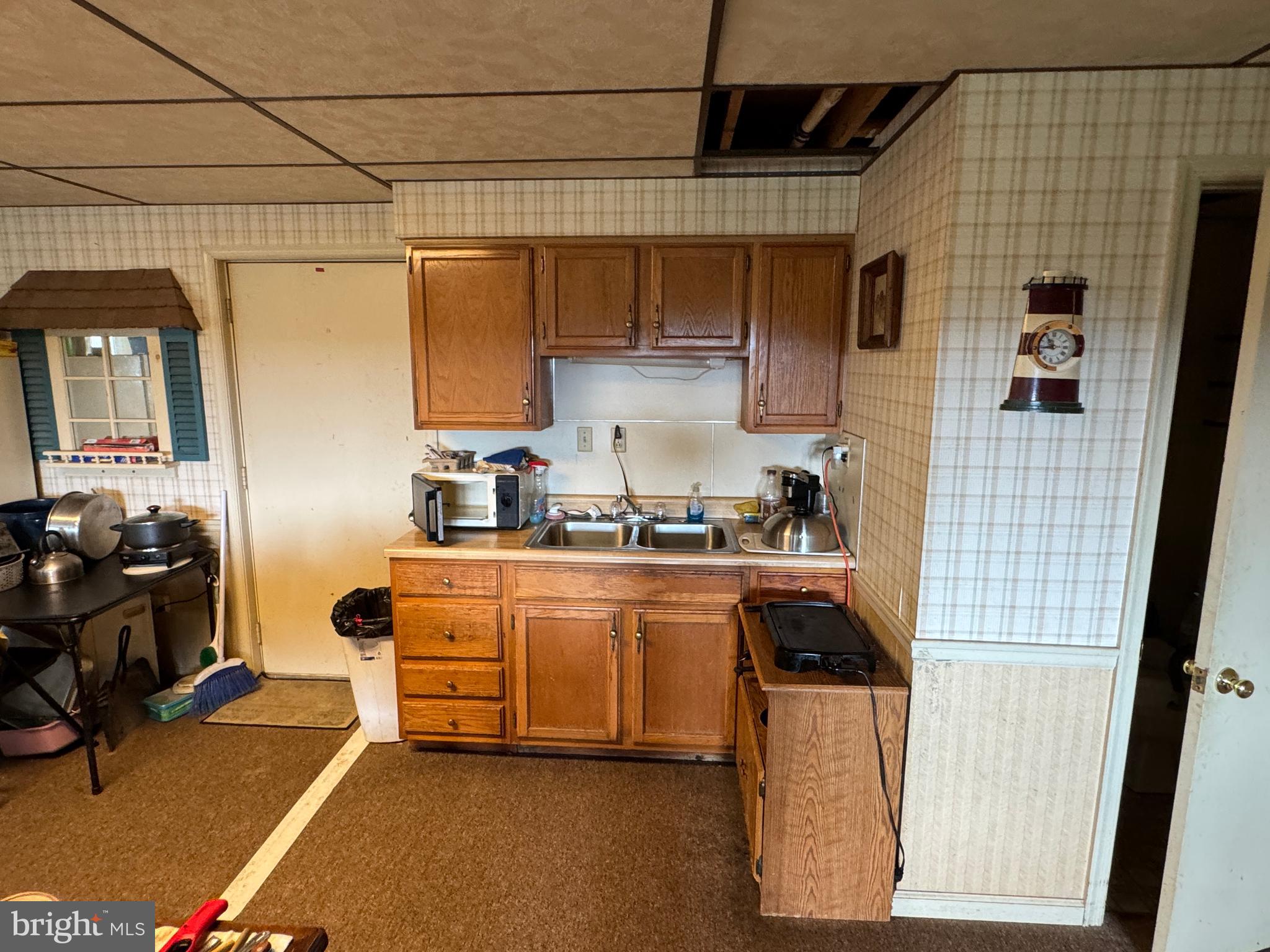 13677 Piney Ridge Road Huntingdon, PA 16652 - Photo 67 of 93 a kitchen with stainless steel appliances granite countertop a sink a stove and refrigerator