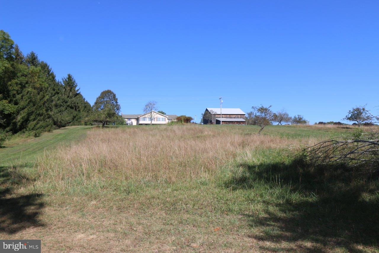13677 Piney Ridge Road Huntingdon, PA 16652 - Photo 92 of 93 a view of a lake in middle of forest