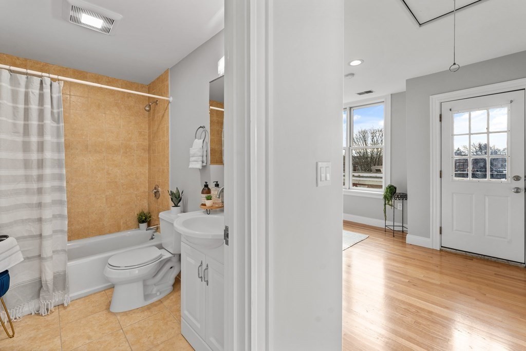 39 Leamington Road, Unit 39 Boston, MA 02135 - Photo 19 of 32 a bathroom with a sink toilet and shower