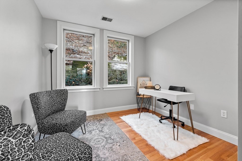 39 Leamington Road, Unit 39 Boston, MA 02135 - Photo 21 of 32 a work room with furniture and a window
