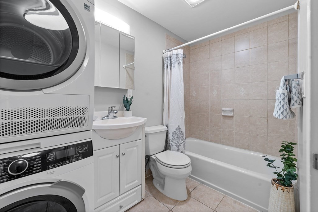 39 Leamington Road, Unit 39 Boston, MA 02135 - Photo 26 of 32 a bathroom with a sink toilet and shower